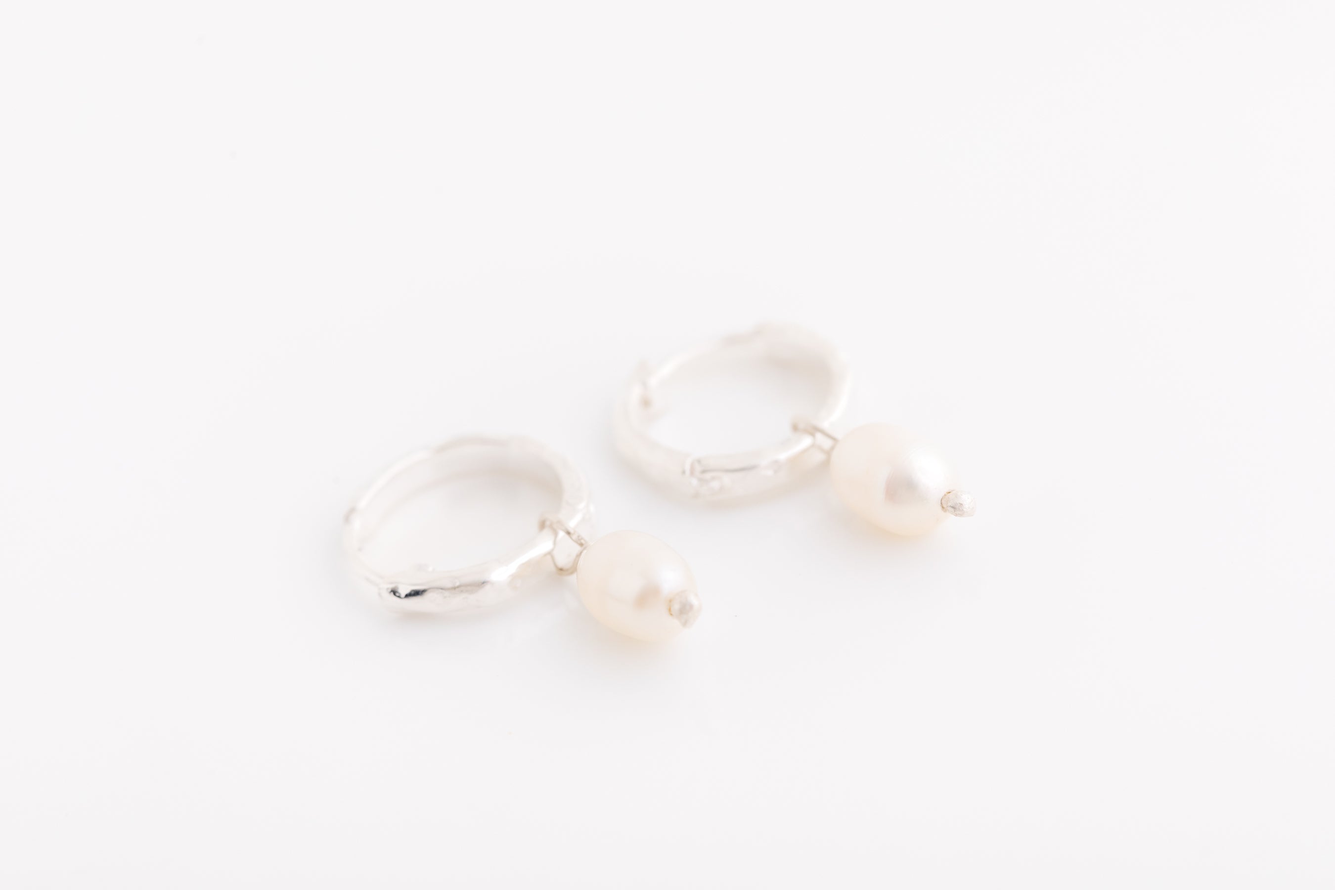 Tiny Silver Pearl Huggies