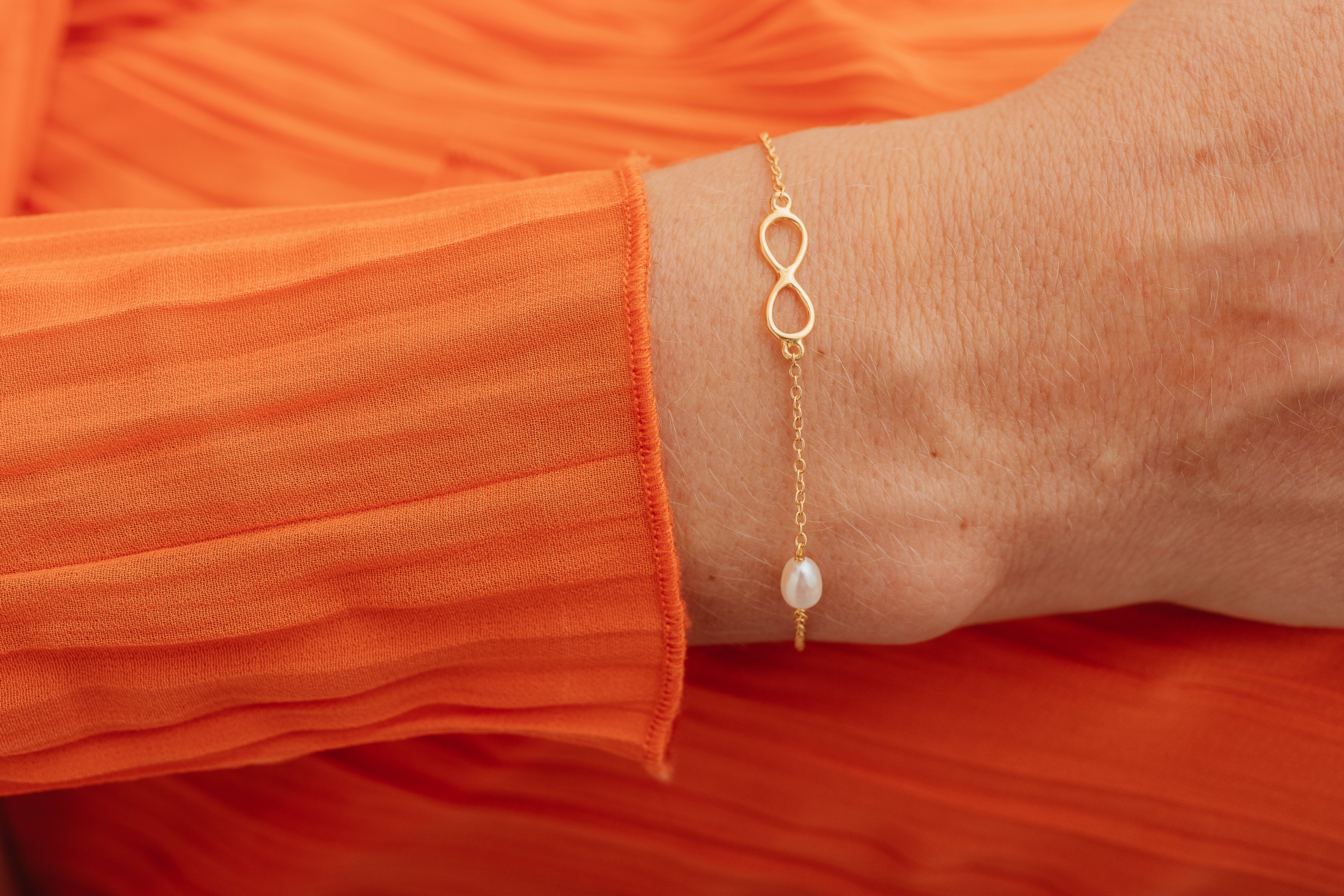 Gold Infinity Bracelet with Pearl