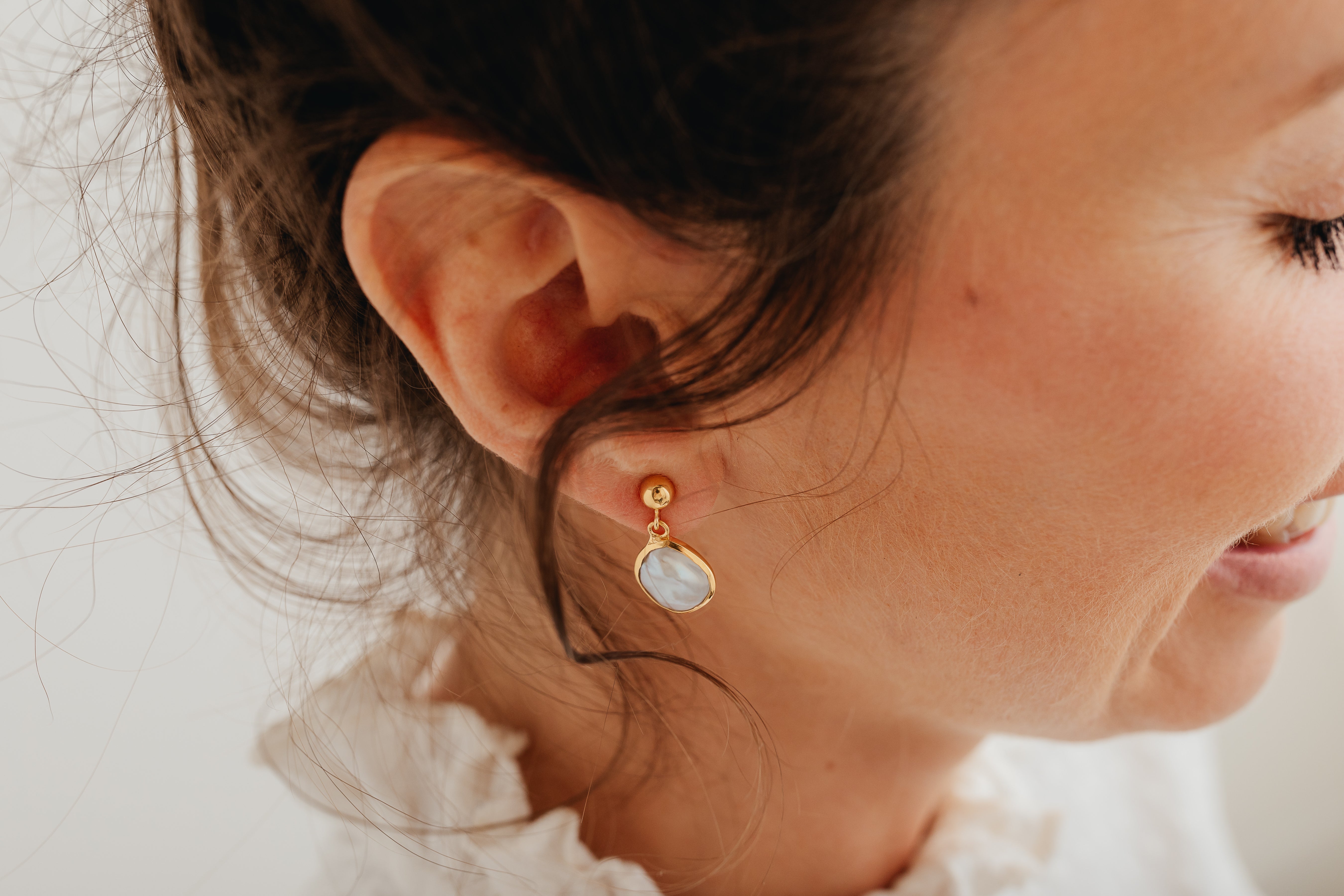 Pearl Drop Earrings in a Gold Setting