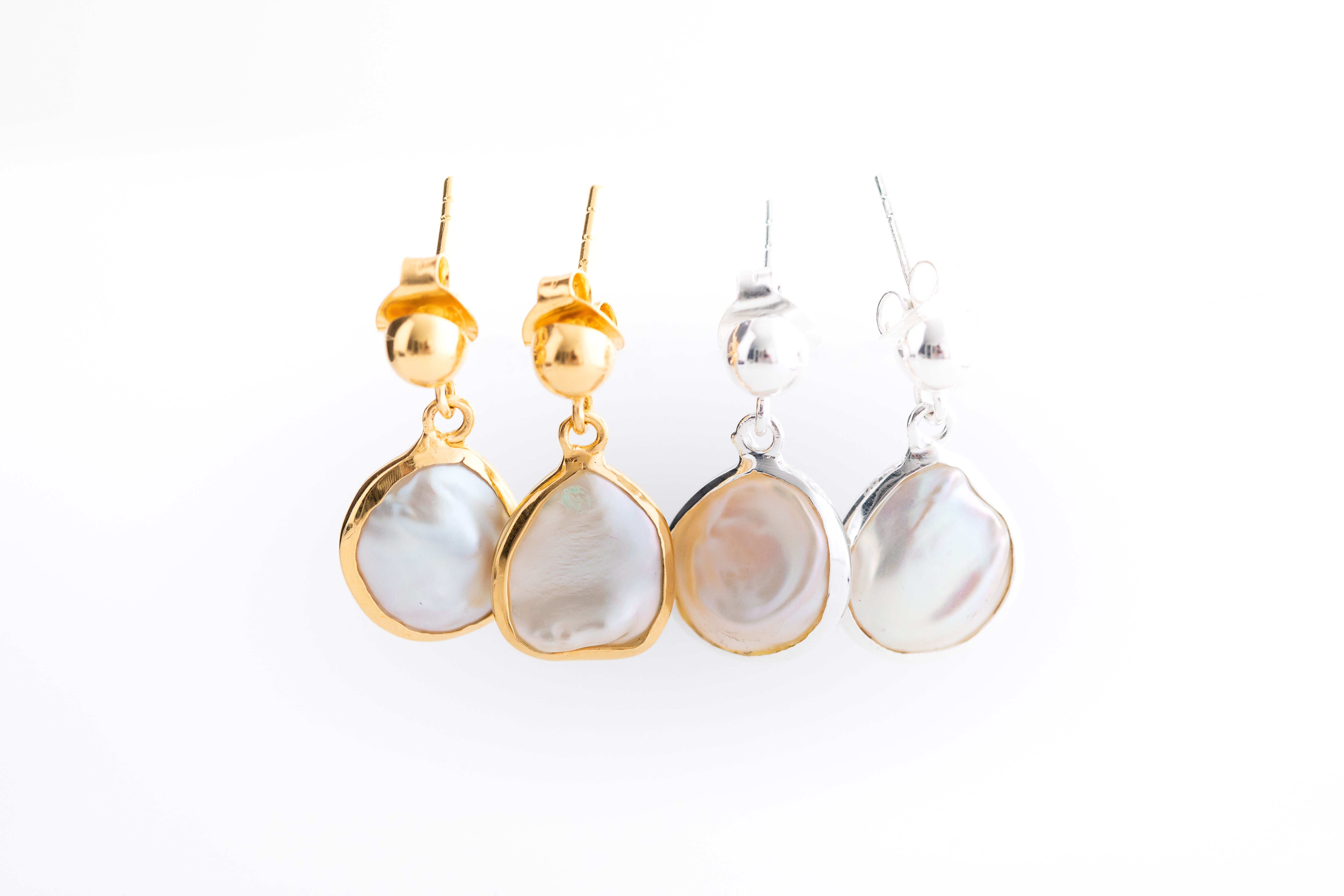 Pearl Drop Earrings in Silver Setting