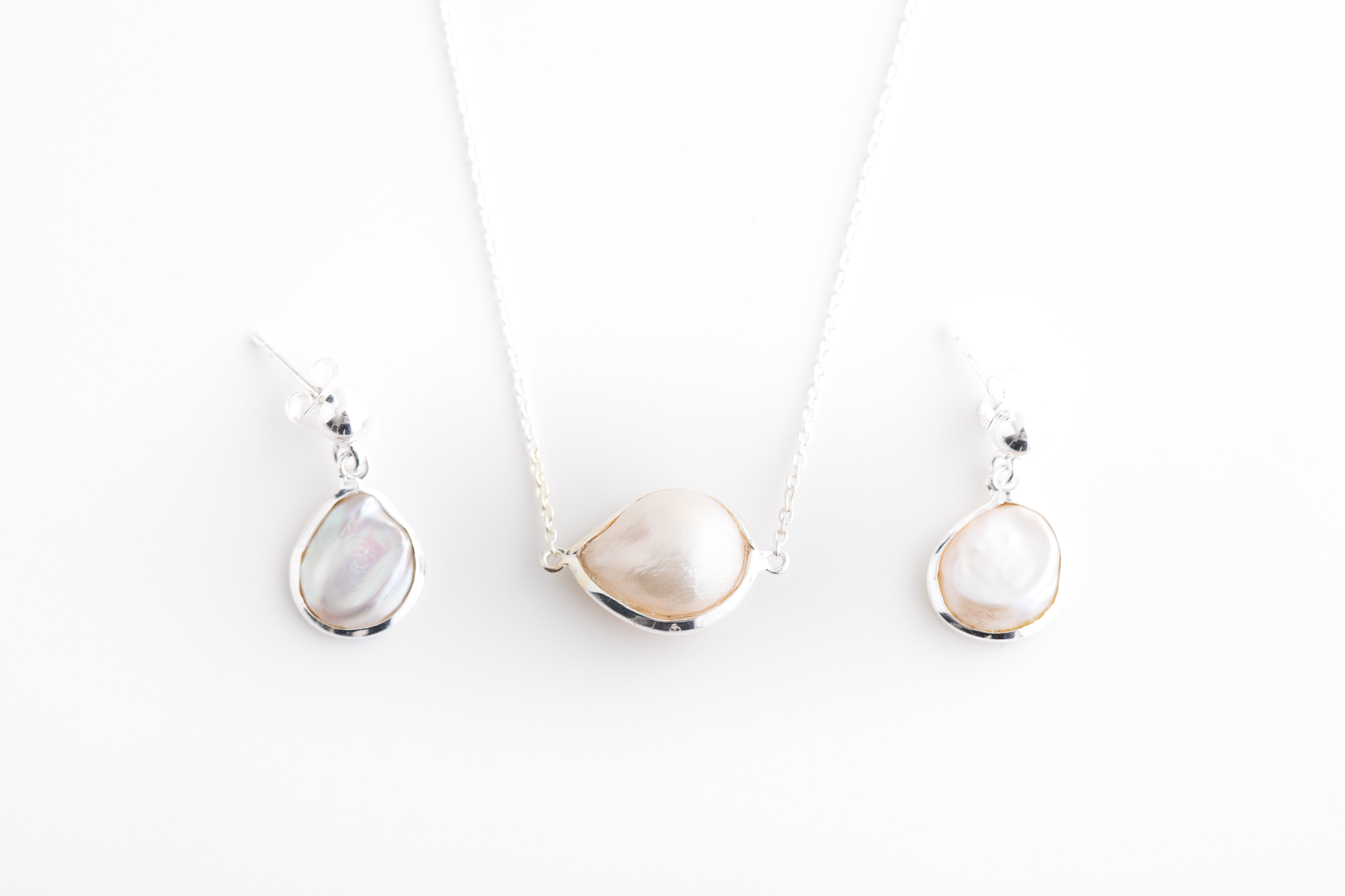 Pearl Drop Earrings in Silver Setting