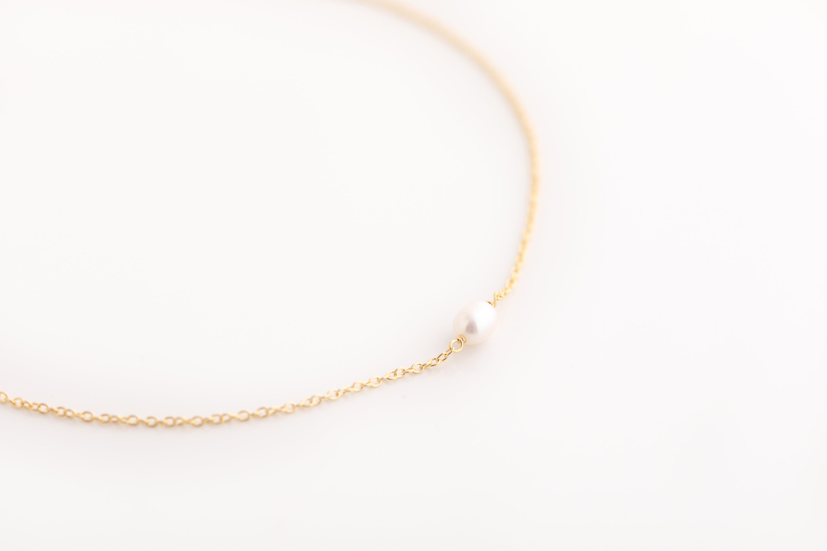 Tiny Gold Pearl Necklace