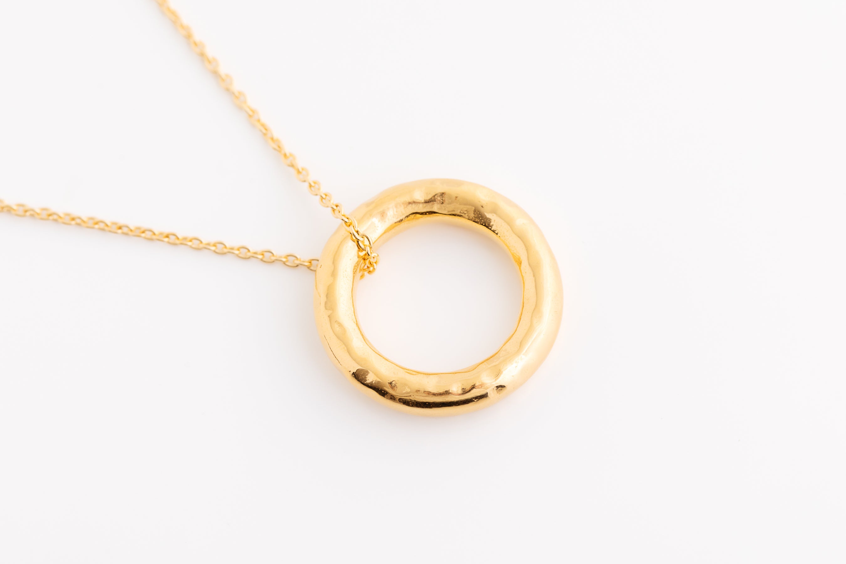 Large Gold Circle on Chain