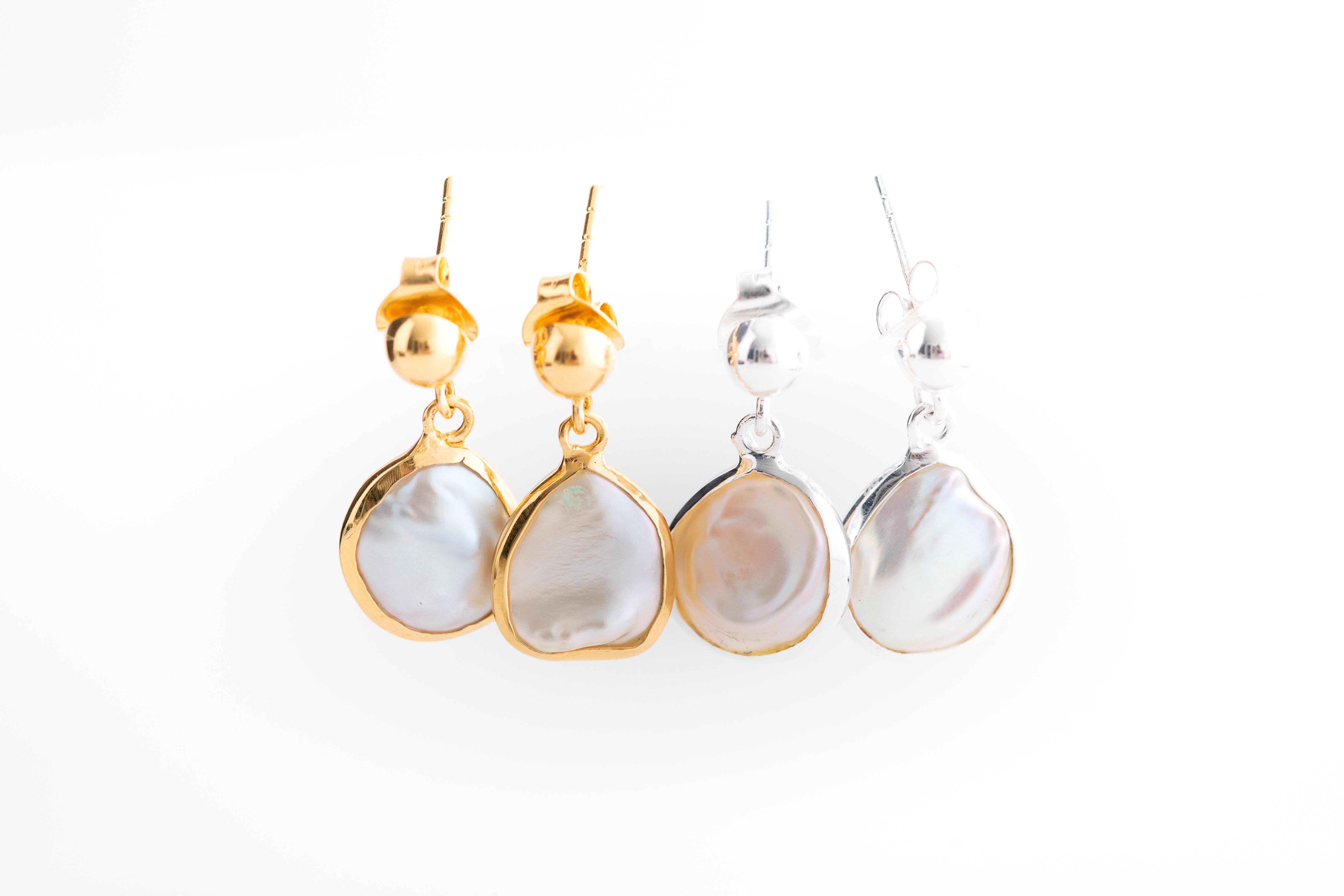 Pearl Drop Earrings in a Gold Setting